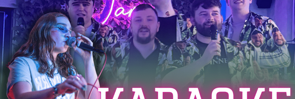 A woman singing into a microphone on stage, with a group of men behind her also holding microphones and smiling under purple lighting. The word 'KARAOKE' is boldly displayed in large white and pink letters at the bottom.